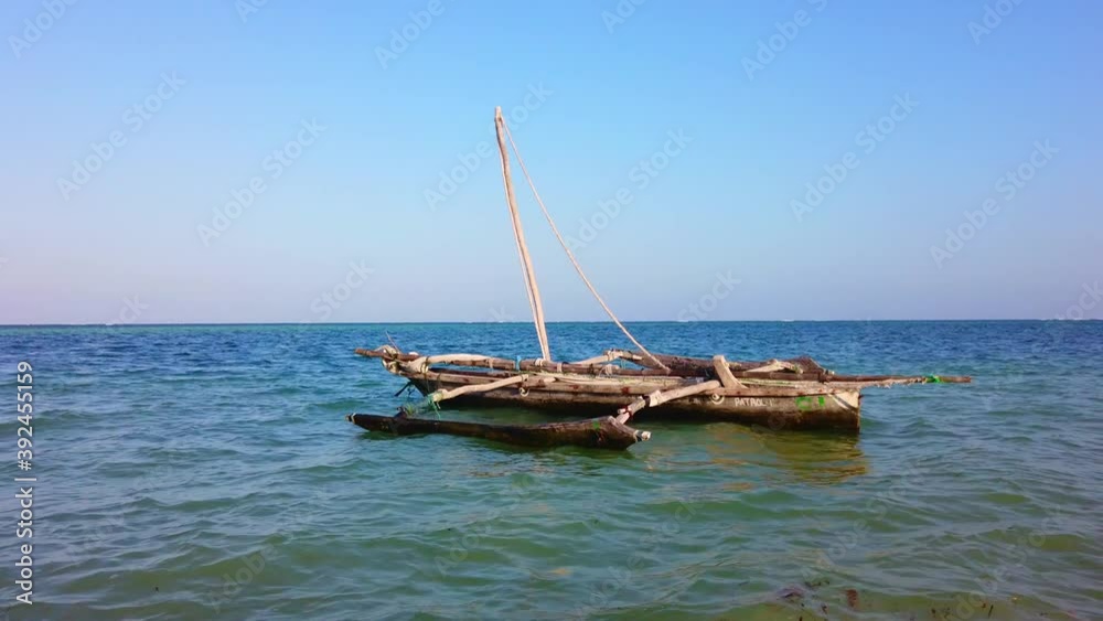 A traditional Boat at Diani Beach - Galu Beach - Kenya, Africa A traditional Boat at Diani Beach - Galu Beach - Kenya, Africa