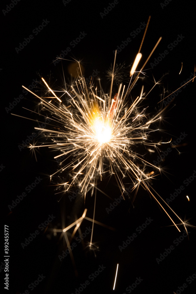 Bengal fire sparkles isolated on black background