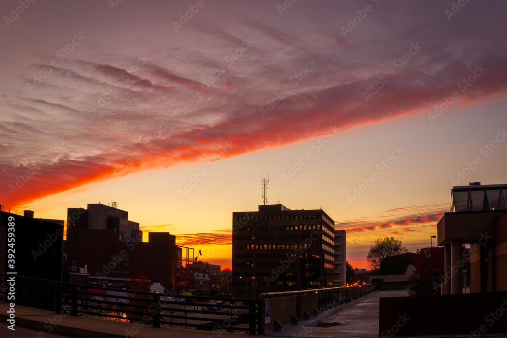 Red sky during sunrise over downtown Lexington, Kentucky