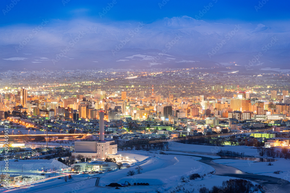 Obraz premium Asahikawa, Japan twilight winter cityscape in Hokkaido