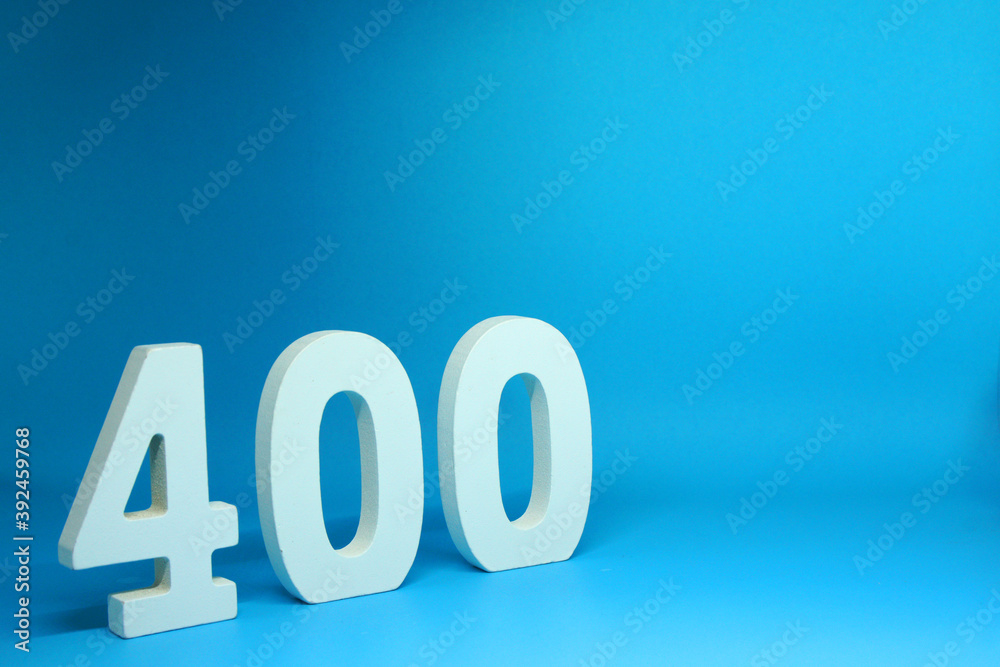 Four Hundred ( 400 ) white wooden Isolated blue Background with Copy Space - New promotion 400% Percentage Business finance Concept Four Hundred ( 400 ) white wooden Isolated blue Background with Copy Space - New promotion 400% Percentage Business finance Concept
