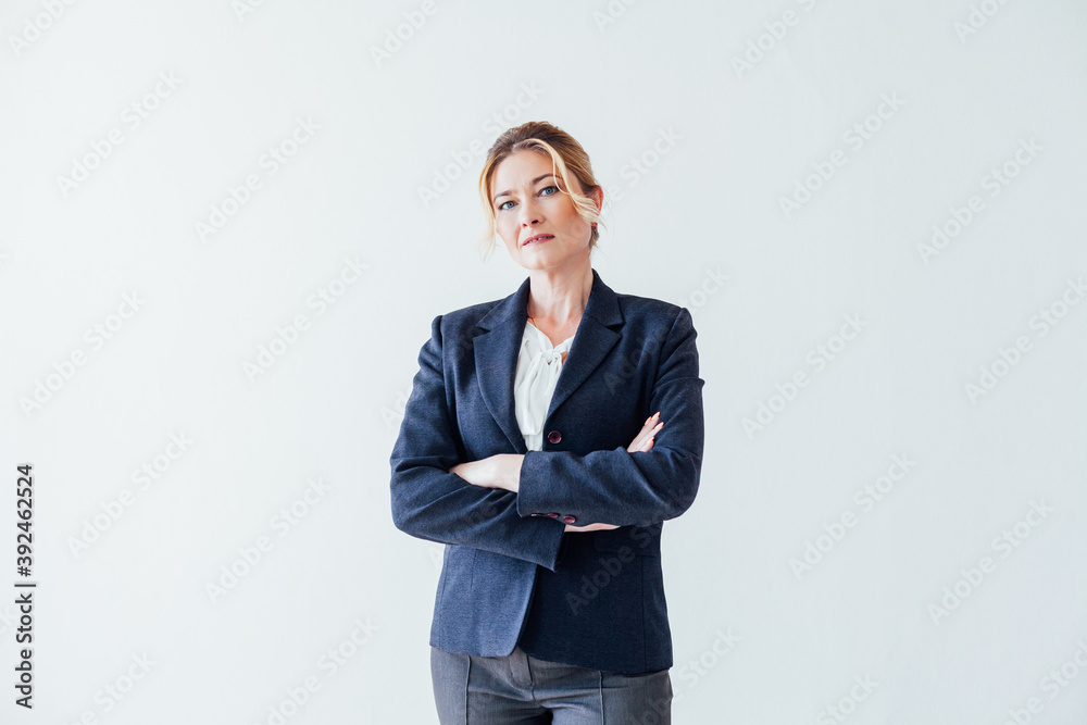 beautiful business woman in business suit at work in the office with documents beautiful business woman in business suit at work in the office with documents