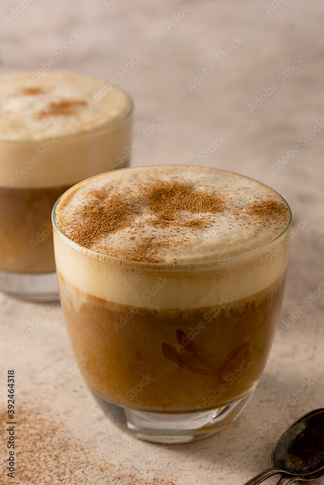 Two glasses of coffee drink with whipped milk, latte hot drink Two glasses of coffee drink with whipped milk, latte hot drink