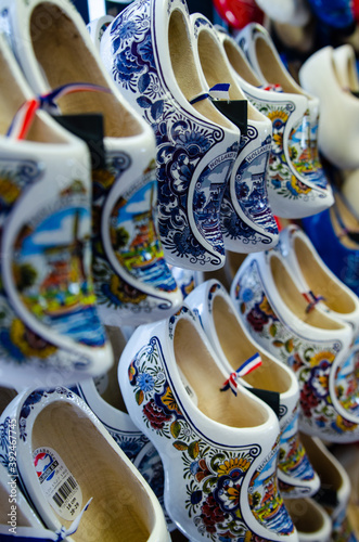Kinderdijk, The Netherlands, August 2019. Souvenir Dutch clogs, produced in different shapes and colors, make a good show in the display.