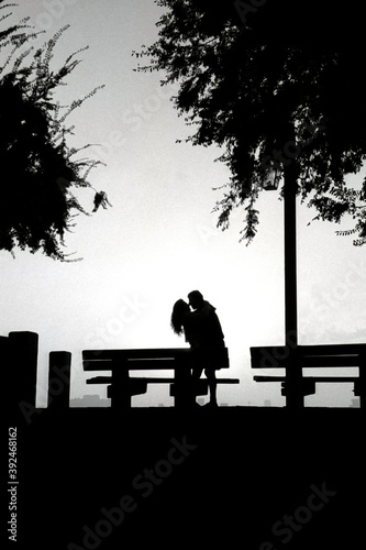 Couple Kissing on River Walk in New Orleans French Quarter