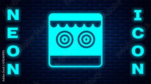 Glowing neon Shooting gallery icon isolated on brick wall background. Vector.