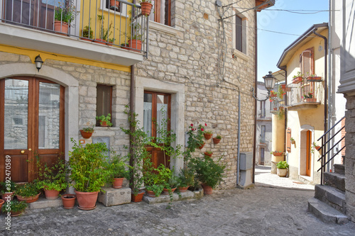 A narrow street among the old houses of Pietrelcina  a medieval village in the Campania region  Italy.