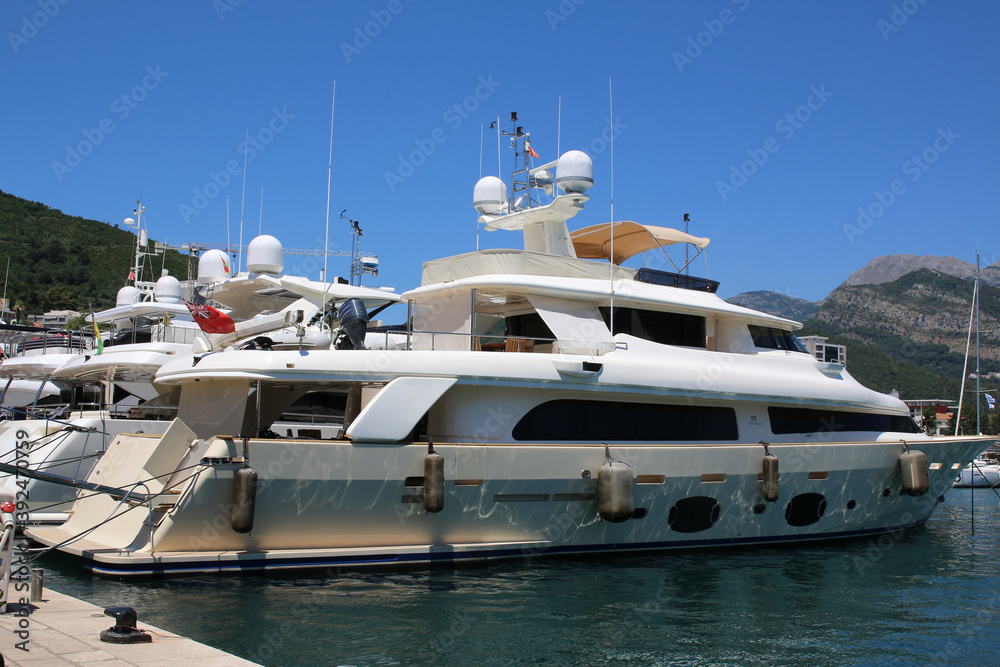 Fototapeta premium Modern yachts from different countries in the seaport of Budva in Montenegro.