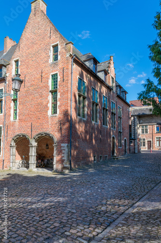 Canvas Print Vertical shot of Groot Begijnhof Leuven in Leuven, Belgium