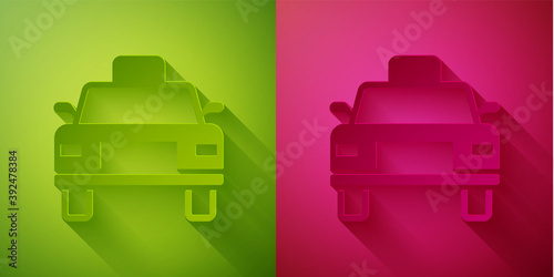 Paper cut Taxi car icon isolated on green and pink background. Paper art style. Vector.