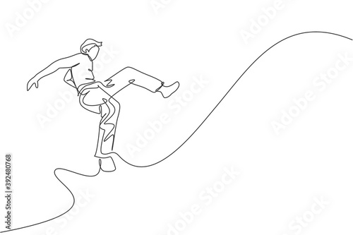 One single line drawing of young energetic man capoeira dancer perform jump dancing fight vector illustration. Traditional martial art lifestyle sport concept. Modern continuous line draw design
