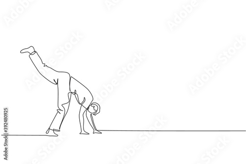 One continuous line drawing of young sporty Brazilian fighter man training capoeira on the beach. Healthy traditional fighting sport concept. Dynamic single line draw design vector illustration