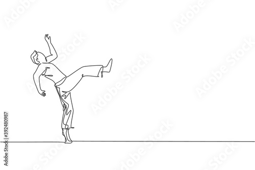 One continuous line drawing of young sporty Brazilian fighter man training capoeira on the beach. Healthy traditional fighting sport concept. Dynamic single line draw design vector illustration