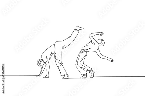 One single line drawing of two young energetic man capoeira dancers perform dancing fight vector illustration. Traditional martial art lifestyle sport concept. Modern continuous line draw design