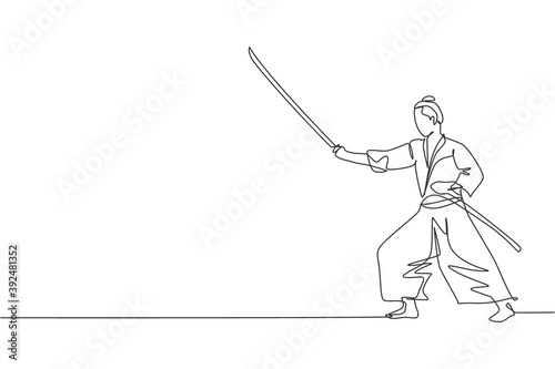 One continuous line drawing of young bravery samurai warrior pose ready to attack at training session. Martial art combative sport concept. Dynamic single line draw graphic design vector illustration