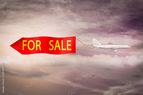 Airplane flying a red banner and text FOR SALE at sunset magenta day. Selling Airline Stocks or Why did sell the airlines or world has changed for the airline industry concept. 3D illustration