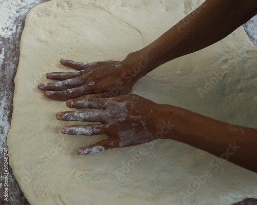 close up of hands kneading dough for make some bread : Indonesia street food