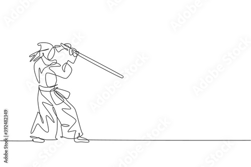 Single continuous line drawing of young sportive man practicing kendo  defense martial art skill on gym sport center. Fighting sport concept. Trendy one line draw design vector illustration graphic