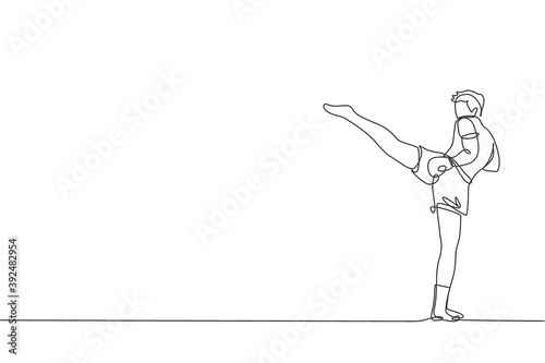 One single line drawing of young energetic muay thai fighter man exercising at gym fitness center vector illustration graphic. Combative thai boxing sport concept. Modern continuous line draw design