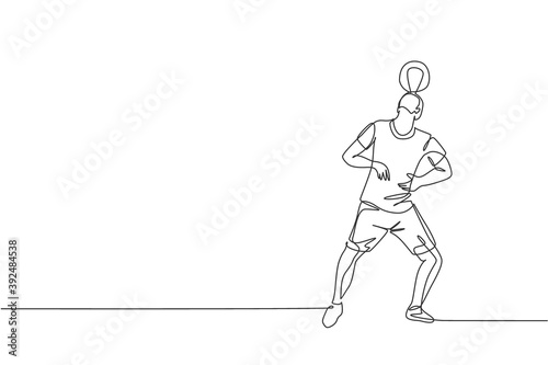 One single line drawing of young happy man perform soccer freestyle, keep the ball on head at the city square vector illustration. Football freestyler sport concept. Modern continuous line draw design