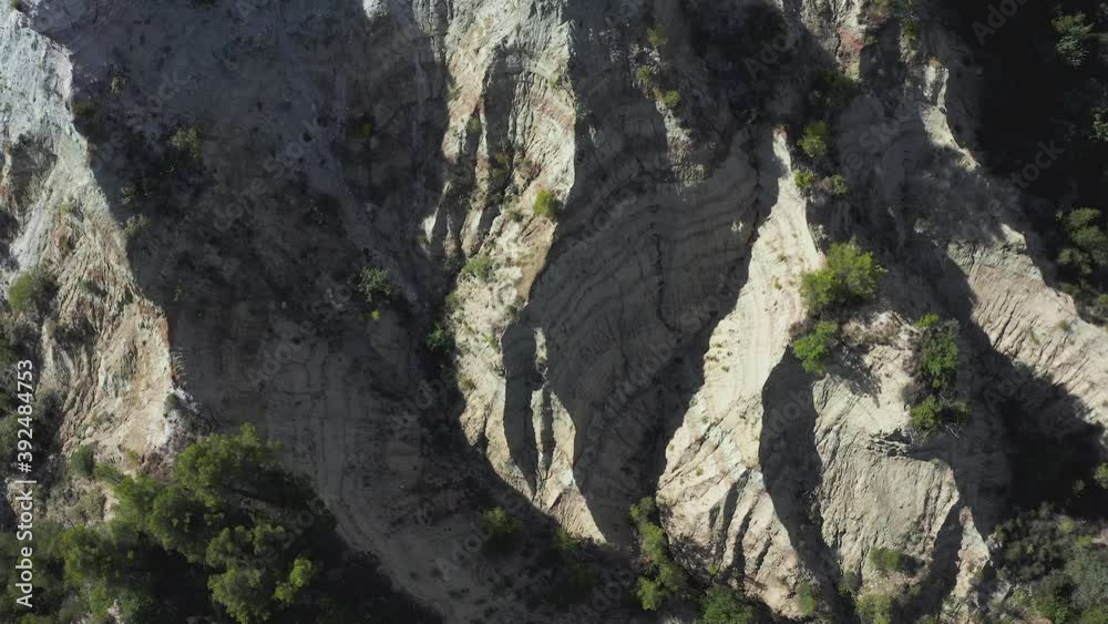 Mountain - Aerial view in Luberon - Going down near the cliff Mountain - Aerial view in Luberon - Going down near the cliff