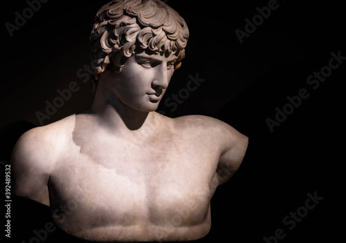 The most beautiful boy in the Roman empire, marble statue. Antinous, a Bithynian Greek youth and lover of Roman Emperor Hadrian, archaeological museum of Athen.