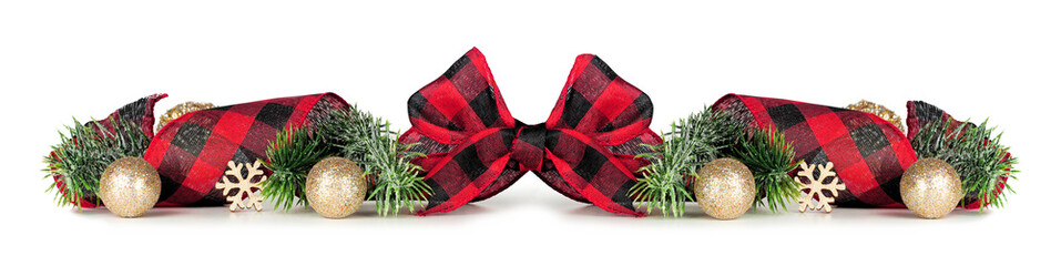 Christmas border of gold ornaments, branches and red and white checked buffalo plaid ribbon isolated on a white background