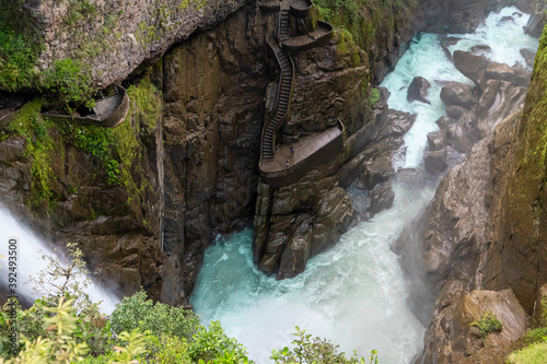 Ecuador, near Banos. View down on the staircases of the Devil's Cauldron . ( Pailon del Diabolo). Amazing Waterfall in middle of a virgin forest.