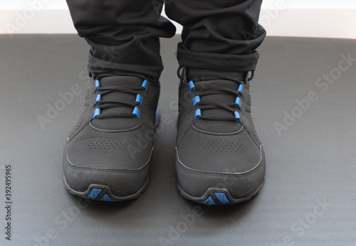 sneakers on grey mat and white background