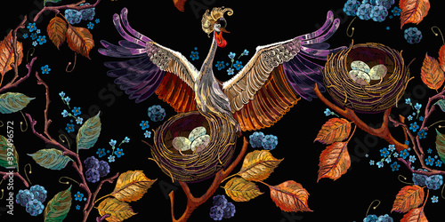 Embroidery crane, wild berries, bird and nest with eggs. Horizontal seamless pattern. Template for design of clothes, tapestry. Fashion spring garden style