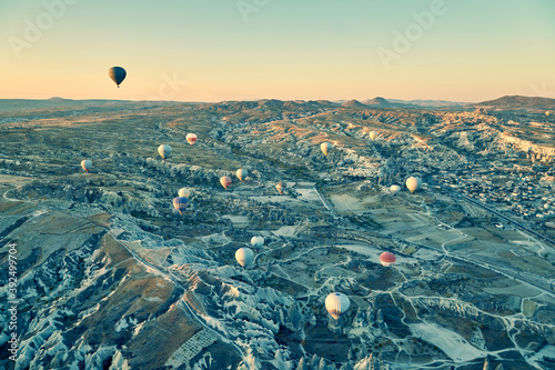 Air balloon floating over rocky valley in Göreme, Turkey