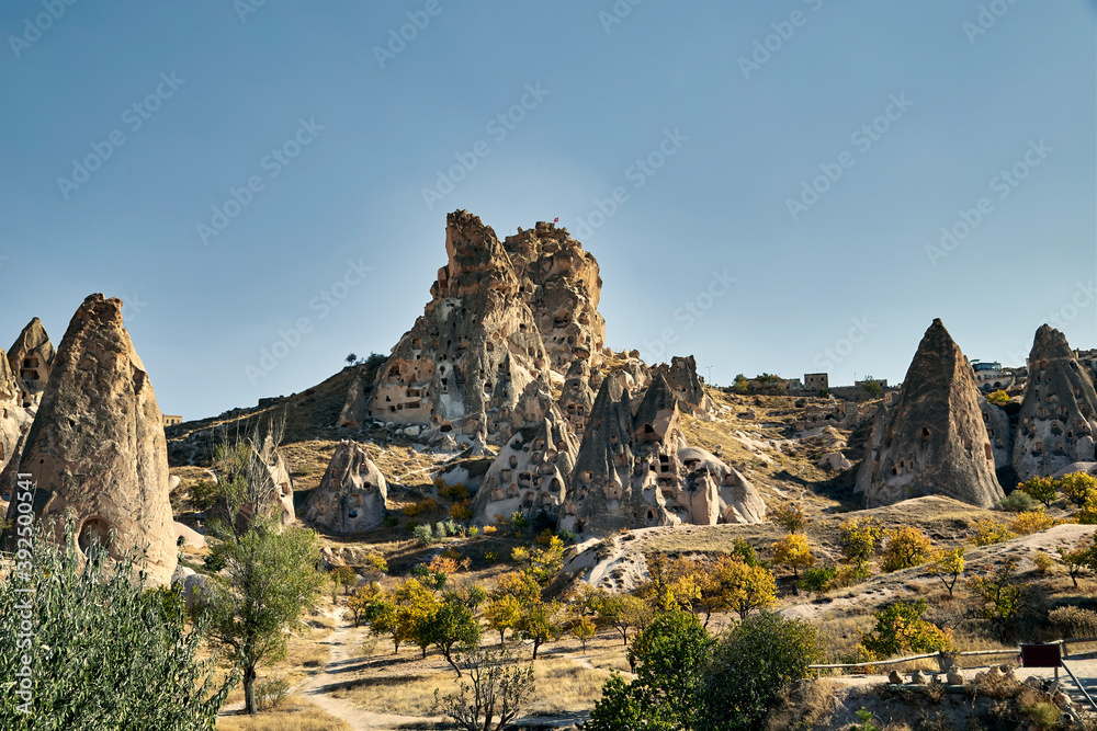 View of valley in Cappadocia, Anatolia, Turkey. Volcanic mountains in Goreme national park, fairy chimneys..