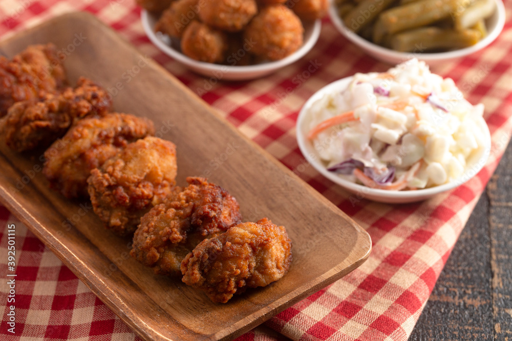 Breaded and Fried Oysters on a Wooden Table Breaded and Fried Oysters on a Wooden Table