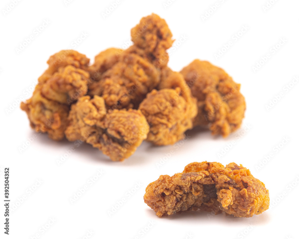 Fried and Crispy Chicken Gizzards on a White Background Fried and Crispy Chicken Gizzards on a White Background
