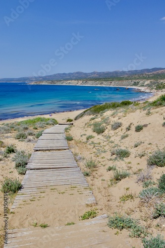 Wooden pathway to the sea, Lara beach, Cyprus 