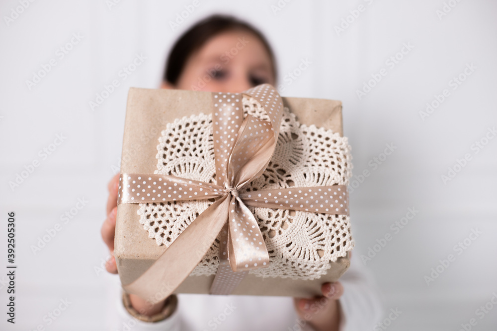 woman holding a gift box woman holding a gift box