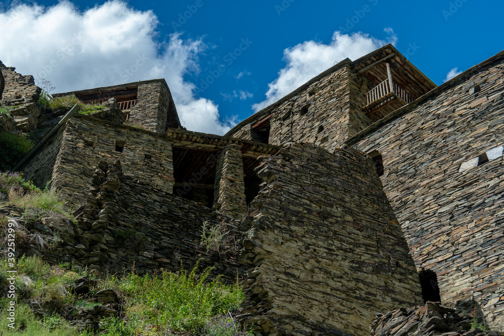 Old Fortress in mountain village Shatili, ruins of medieval castle