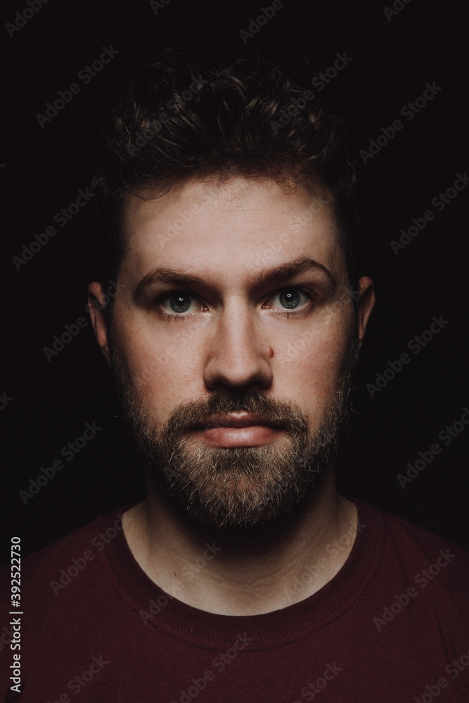 Portrait of european male with neutral face on black and white Portrait of european male with neutral face on black and white