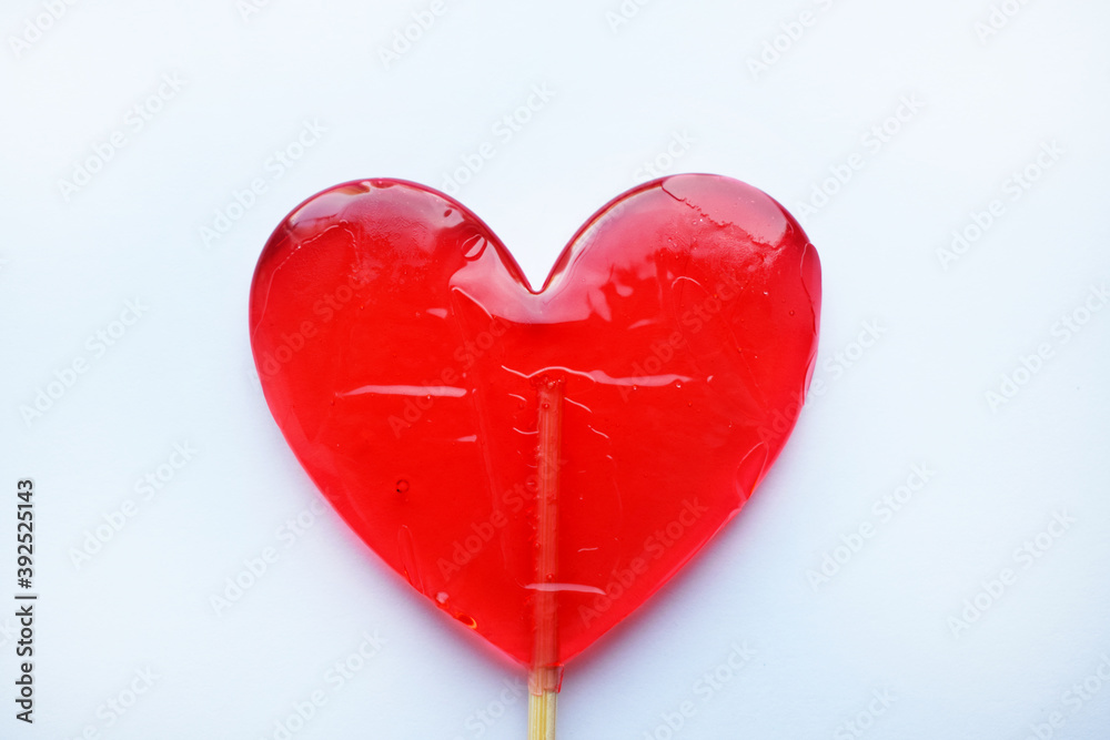 Red lollipops. Red hearts. Candy. Love and sweet concept. Valentine day. White background.