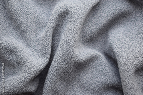 Plush gray micro fleece background. photo