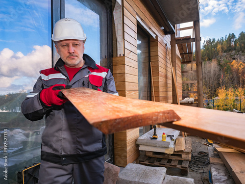 Two wooden boards in hands ...