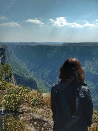 Girl - Cânion Fortaleza - Parque Nacional de Aparados da Serra - Canyons Cambará do Sul Aparados da Serra National Park is in south Brazil. It’s known for the deep Fortaleza and Itaimbezinho Canyon