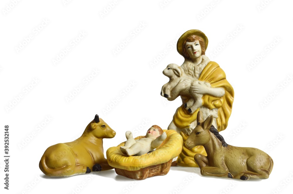 Nativity scene with shepherd and baby Jesus in manger isolated on white background Nativity scene with shepherd and baby Jesus in manger isolated on white background