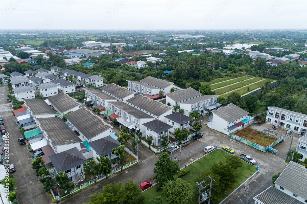 Aerial View drone camera of Houses Residential in Thailand Drone Above View Summer Blue Sky Estate Agent High angle view.