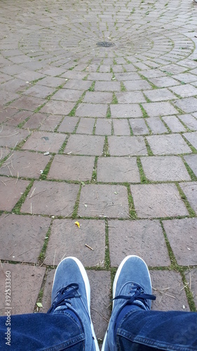 Blue Shoes on Rounded Ground