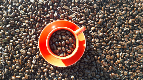 Top View of a Red Coffee Cup on Coffee Beans