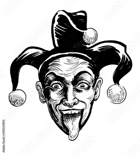 Laughing jester head. Ink black and white drawing