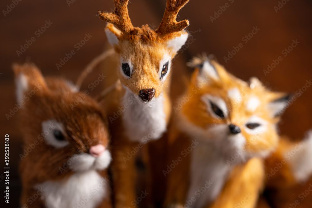 Obraz premium Reindeer fox and squirrel furry stuffed animals shot with macro lens