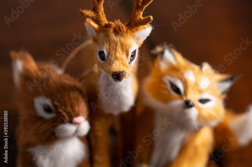 Fototapeta Naklejka Na Ścianę i Meble -  Reindeer fox and squirrel furry stuffed animals shot with macro lens