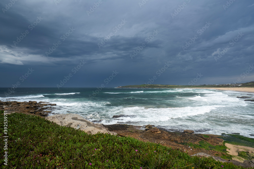 Storm clouds over the popular surf beach called Maroubra Beach